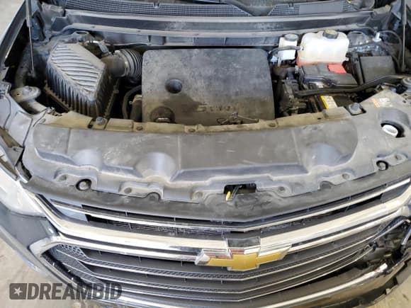 ✅ 2021 Chevrolet Traverse LT Cloth • VIN: 1GNERGKW5MJ233918 • Lot: 84219555. Listed on Copart with 82,663 mi. Free auction sales archive from the USA and detailed vehicle history report at DreamBid. Image 12.