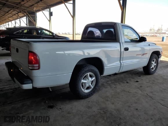 ✅ 1999 Dodge Dakota SLT • VIN: 1B7FL26X6XS180827 • Lot: 85789944. Wystawiony na Copart z przebiegiem 85 166 mil. Bezpłatny archiwum sprzedaży aukcyjnych z USA i szczegółowy raport historii pojazdu na DreamBid. Zdjęcie 3.