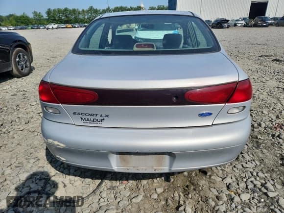 ✅ 1997 Ford Escort LX • VIN: 1FALP13P3VW320317 • Lot: 66228535. Wystawiony na Copart z przebiegiem 73 410 mil. Bezpłatny archiwum sprzedaży aukcyjnych z USA i szczegółowy raport historii pojazdu na DreamBid. Zdjęcie 6.