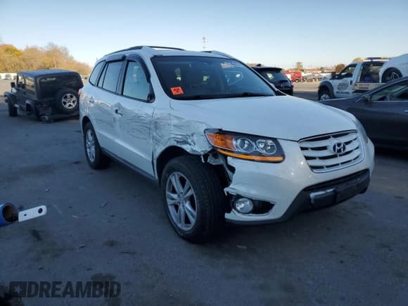 ✅ 2011 Hyundai Santa Fe Limited • VIN: 5XYZKDAG2BG090866 • Lot: 77454264. Listed on Copart with 90,827 mi. Free auction sales archive from the USA and detailed vehicle history report at DreamBid. Image 4.