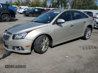 ✅ 2013 Chevrolet Cruze LTZ • VIN: 1G1PG5SB5D7286651 • Лот: 81876485. Опубликован ранее на Copart с пробегом 140 810 миль. Бесплатный доступ к архиву аукционных продаж из США и подробный отчёт об истории автомобиля на DreamBid. Изображение 1.