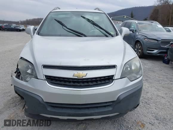 2015 Chevrolet Captiva Sport LS z VIN 3GNAL2EK7FS520108, wystawiony jako IAAI lot #41655207 z przebiegiem 201 135 mil mil oraz . Historia ofert i sprzedaży dostępna na DreamBid. Obrazek 13.