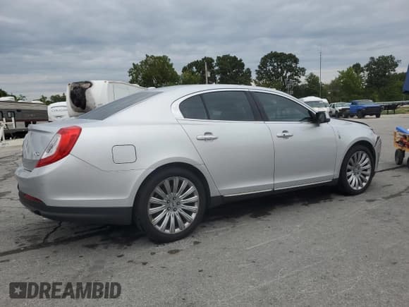 ✅ 2014 Lincoln MKS • VIN: 1LNHL9DK4EG611203 • Лот: 70106985. Опубликован ранее на Copart с пробегом 130 792 миль. Бесплатный доступ к архиву аукционных продаж из США и подробный отчёт об истории автомобиля на DreamBid. Изображение 3.