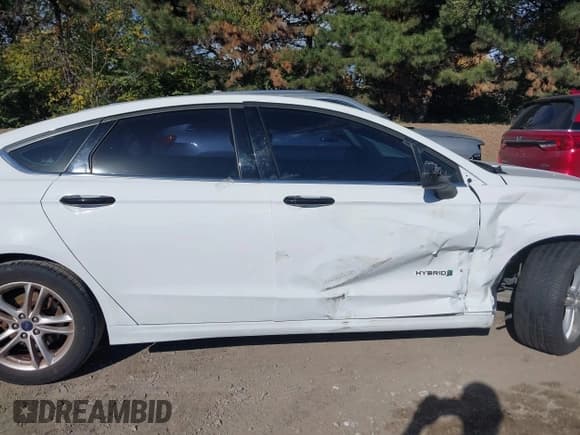 ✅ 2018 Ford Fusion SE • VIN: 3FA6P0LU7JR158282 • Lot: 43618839. Listed on IAAI with 103,677 mi. Free auction sales archive from the USA and detailed vehicle history report at DreamBid. Image 13.