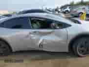 2025 Toyota Prius LE with VIN JTDACAAU4S3052719, listed as a IAAI auction lot 43175096 with 23,082 mi miles and . Bid and sale history available at DreamBid. Image 6.