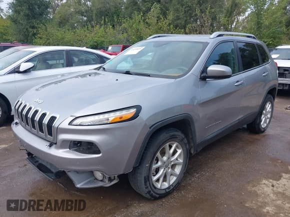 ✅ 2014 Jeep Cherokee Latitude • VIN: 1C4PJMCS2EW229882 • Lot: 43239899. Listed on IAAI with 162,635 mi. Free auction sales archive from the USA and detailed vehicle history report at DreamBid. Image 18.