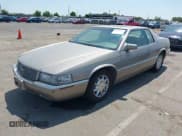 ✅ 2002 Cadillac Eldorado ESC • VIN: 1G6EL12Y92B101330 • Lot: 42548463. Listed on IAAI with 162,168 mi. Free auction sales archive from the USA and detailed vehicle history report at DreamBid. Image 2.