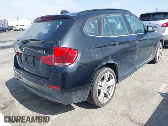 ✅ 2013 BMW X1 28i • VIN: WBAVM1C5XDVW41217 • Лот: 41596352. Опубликован ранее на IAAI с пробегом 76 792 миль. Бесплатный доступ к архиву аукционных продаж из США и подробный отчёт об истории автомобиля на DreamBid. Изображение 4.