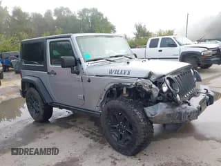✅ 2016 Jeep Wrangler Willys Wheeler • VIN: 1C4AJWAG8GL248344 • Lot: 43257411. Listed on IAAI with 125,138 mi. Free auction sales archive from the USA and detailed vehicle history report at DreamBid. Image 1.