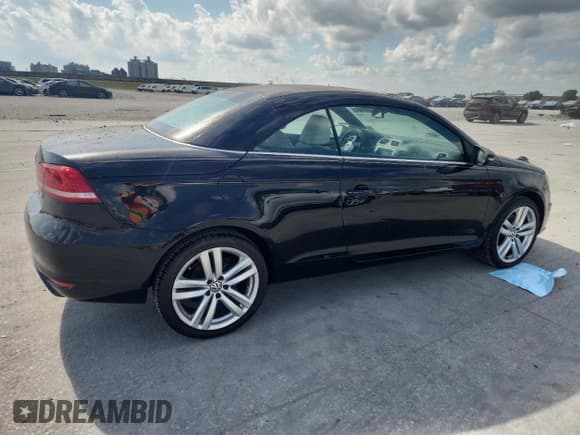 ✅ 2012 Volkswagen Eos Lux • VIN: WVWFW7AH2CV003091 • Лот: 82094645. Опубликован ранее на Copart с пробегом 194 239 миль. Бесплатный доступ к архиву аукционных продаж из США и подробный отчёт об истории автомобиля на DreamBid. Изображение 3.