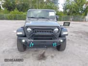 ✅ 2023 Jeep Wrangler Sport • VIN: 1C4HJXDG2PW677154 • Lot: 43756077. Listed on IAAI with 35,896 mi. Free auction sales archive from the USA and detailed vehicle history report at DreamBid. Image 13.