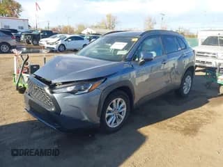 ✅ 2022 Toyota Corolla Cross LE • VIN: 7MUCAAAG5NV009458 • Lot: 43602100. Listed on IAAI with 33,797 mi. Free auction sales archive from the USA and detailed vehicle history report at DreamBid. Image 2.