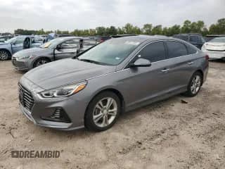 2018 Hyundai Sonata SEL с VIN 5NPE34AF5JH694471, выставлен на аукционе Copart как лот 89831945 с пробегом 85 041 миль миль и Списание • Salvage title. История ставок и продаж доступна на DreamBid. Изображение 1.