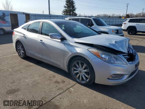 2012 Hyundai Azera с VIN KMHFH4JG8CA186371, выставлен на аукционе Copart как лот 48458795 с пробегом 154 782 миль миль и Списание • Salvage title. История ставок и продаж доступна на DreamBid. Изображение 4.