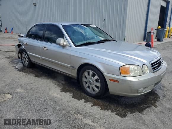 ✅ 2004 Kia Optima LX • VIN: KNAGD128845342264 • Lot: 61550655. Listed on Copart with 203,962 mi. Free auction sales archive from the USA and detailed vehicle history report at DreamBid. Image 4.