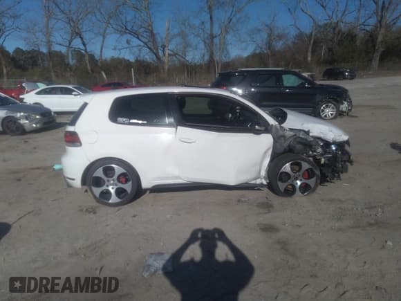 ✅ 2012 Volkswagen Golf GTI w/Conv & Sunroof • VIN: WVWEV7AJ5CW094384 • Lot: 41744860. Listed on IAAI with 157,285 mi. Free auction sales archive from the USA and detailed vehicle history report at DreamBid. Image 14.