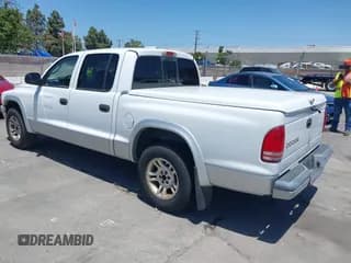 ✅ 2003 Dodge Dakota SLT • VIN: 1D7HL48N03S184534 • Lot: 42423520. Wystawiony na IAAI z przebiegiem 197 070 mil. Bezpłatny archiwum sprzedaży aukcyjnych z USA i szczegółowy raport historii pojazdu na DreamBid. Zdjęcie 3.