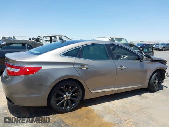 2012 Hyundai Azera с VIN KMHFH4JG1CA153423, выставлен на аукционе IAAI как лот 39641025 с пробегом 274 171 миль миль и . История ставок и продаж доступна на DreamBid. Изображение 13.