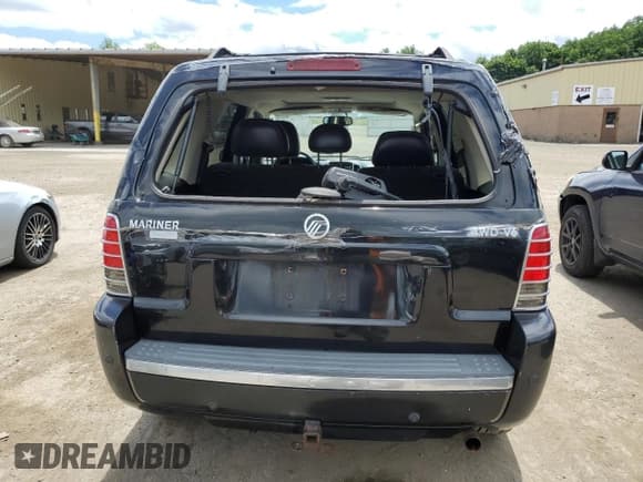 ✅ 2005 Mercury Mariner Luxury • VIN: 4M2CU57185DJ16120 • Лот: 61803024. Опубликован ранее на Copart с пробегом 176 498 миль. Бесплатный доступ к архиву аукционных продаж из США и подробный отчёт об истории автомобиля на DreamBid. Изображение 6.