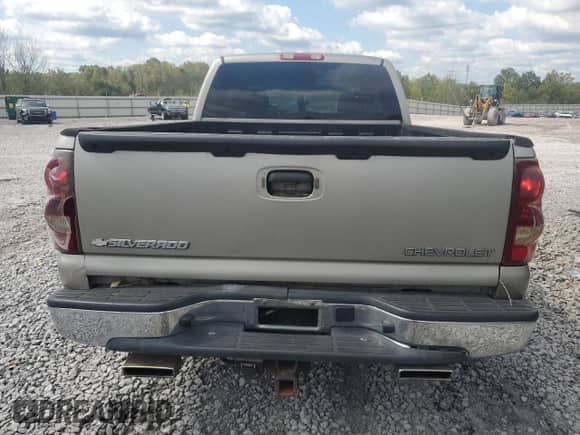 2003 Chevrolet Silverado 1500 LS with VIN 2GCEC19T231258044, listed as a Copart auction lot 84606025 with 174,012 mi miles and Salvage title. Bid and sale history available at DreamBid. Image 6.