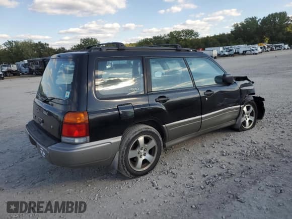 ✅ 1999 Subaru Forester S • VIN: JF1SF655XXH704240 • Lot: 73221344. Listed on Copart with 135,514 mi. Free auction sales archive from the USA and detailed vehicle history report at DreamBid. Image 3.