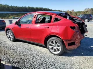 ✅ 2024 Tesla Model Y Long Range • VIN: 7SAYGDEE5RA217617 • Lot: 91006065. Listed on Copart with 15,664 mi. Free auction sales archive from the USA and detailed vehicle history report at DreamBid. Image 2.