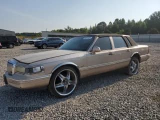✅ 1996 Lincoln Town Car Executive • VIN: 1LNLM81W4TY665763 • Lot: 66870325. Listed on Copart with 160,789 mi. Free auction sales archive from the USA and detailed vehicle history report at DreamBid. Image 1.