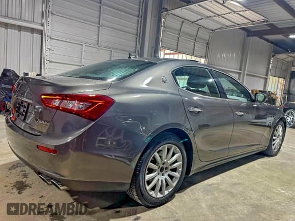 ✅ 2017 Maserati Ghibli • VIN: ZAM57XSA9H1206127 • Lot: 94841135. Wystawiony na Copart z przebiegiem 12 718 mil. Bezpłatny archiwum sprzedaży aukcyjnych z USA i szczegółowy raport historii pojazdu na DreamBid. Zdjęcie 4.