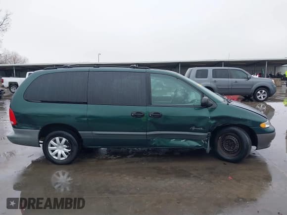 ✅ 1997 Plymouth Grand Voyager • VIN: 2P4GP44R5VR377345 • Lot: 41435749. Wystawiony na IAAI z przebiegiem 191 298 mil. Bezpłatny archiwum sprzedaży aukcyjnych z USA i szczegółowy raport historii pojazdu na DreamBid. Zdjęcie 13.