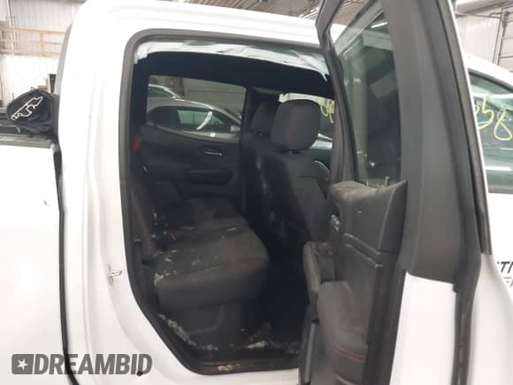 2025 Chevrolet Colorado 4WD Z71 with VIN 1GCPTDEK3S1121299, listed as a IAAI auction lot 43455862 with 2,148 mi miles and . Bid and sale history available at DreamBid. Image 7.