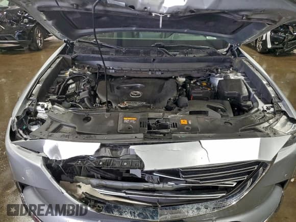 ✅ 2018 Mazda CX-9 Grand Touring • VIN: JM3TCBDY1J0202550 • Lot: 93621155. Listed on Copart with 106,789 mi. Free auction sales archive from the USA and detailed vehicle history report at DreamBid. Image 12.