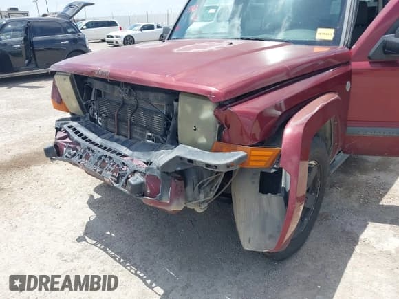 ✅ 2007 Jeep Commander Sport • VIN: 1J8HG48P87C618000 • Lot: 42705799. Listed on IAAI with 207,938 mi. Free auction sales archive from the USA and detailed vehicle history report at DreamBid. Image 6.