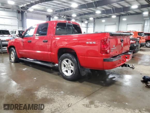 2008 Dodge Dakota z VIN 1D7HW68K58S581897, wystawiony jako Copart lot #81428034 z przebiegiem 106 776 mil mil oraz Szkoda całkowita • Salvage title. Historia ofert i sprzedaży dostępna na DreamBid. Obrazek 2.