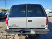 ✅ 1999 GMC Suburban • VIN: 3GKFK16R6XG549955 • Lot: 69302585. Listed on Copart with 204,949 mi. Free auction sales archive from the USA and detailed vehicle history report at DreamBid. Image 6.