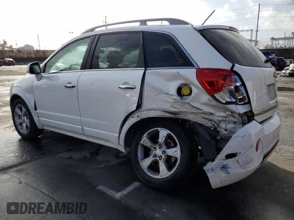 2014 Chevrolet Captiva Sport LTZ z VIN 3GNAL4EK3ES648727, wystawiony jako Copart lot #85587354 z przebiegiem 135 857 mil mil oraz Szkoda całkowita • Salvage title. Historia ofert i sprzedaży dostępna na DreamBid. Obrazek 2.