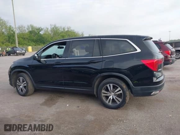 ✅ 2018 Honda Pilot EX-L • VIN: 5FNYF5H56JB016415 • Lot: 42047097. Listed on IAAI with 76,894 mi. Free auction sales archive from the USA and detailed vehicle history report at DreamBid. Image 14.