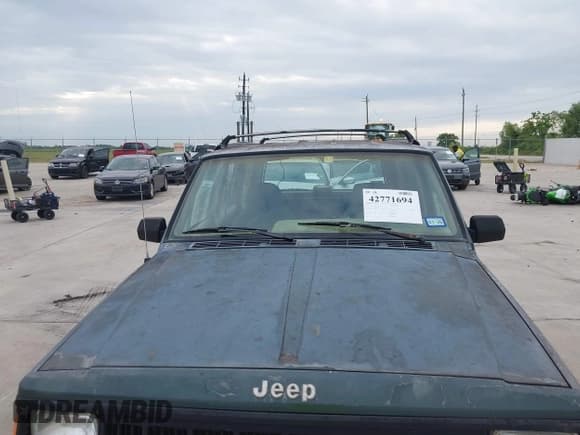 ✅ 1994 Jeep Cherokee Sport • VIN: 1J4FT68S9RL217112 • Lot: 42771694. Listed on IAAI with 189,770 mi. Free auction sales archive from the USA and detailed vehicle history report at DreamBid. Image 6.