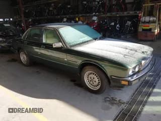 ✅ 1988 Jaguar XJ • VIN: SAJHV1543JC508471 • Lot: 43725231. Listed on IAAI with 80,894 mi. Free auction sales archive from the USA and detailed vehicle history report at DreamBid. Image 1.