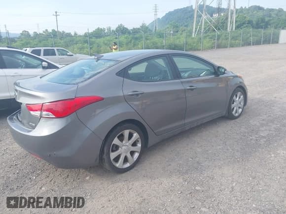 ✅ 2013 Hyundai Elantra GLS • VIN: 5NPDH4AE5DH357503 • Lot: 42606676. Listed on IAAI with 279,824 mi. Free auction sales archive from the USA and detailed vehicle history report at DreamBid. Image 4.