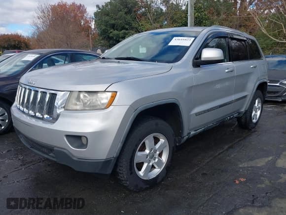 ✅ 2011 Jeep Grand Cherokee Laredo • VIN: 1J4RR4GGXBC705388 • Лот: 43641023. Опубликован ранее на IAAI с пробегом 262 843 миль. Бесплатный доступ к архиву аукционных продаж из США и подробный отчёт об истории автомобиля на DreamBid. Изображение 2.
