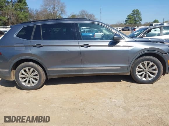 ✅ 2018 Volkswagen Tiguan SEL • VIN: 3VV3B7AX6JM001231 • Лот: 41781659. Опубликован ранее на IAAI с пробегом 137 930 миль. Бесплатный доступ к архиву аукционных продаж из США и подробный отчёт об истории автомобиля на DreamBid. Изображение 13.