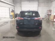 ✅ 2018 Toyota RAV4 LE • VIN: 2T3BFREV6JW767297 • Lot: 43736278. Listed on IAAI with 99,323 mi. Free auction sales archive from the USA and detailed vehicle history report at DreamBid. Image 17.