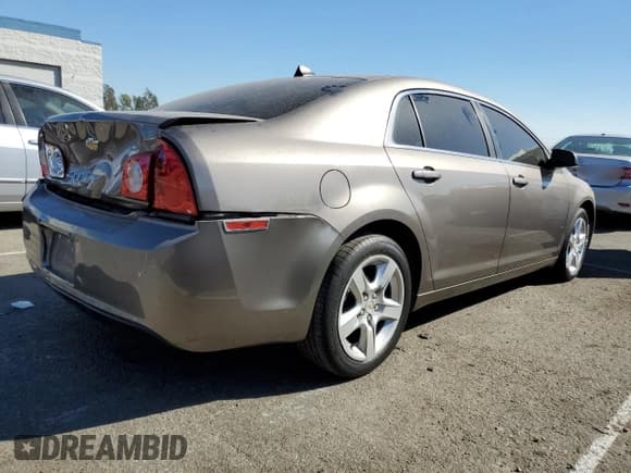 ✅ 2012 Chevrolet Malibu 1LS • VIN: 1G1ZB5E00CF156167 • Lot: 77576674. Listed on Copart with 86,713 mi. Free auction sales archive from the USA and detailed vehicle history report at DreamBid. Image 3.