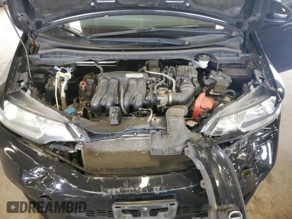 ✅ 2017 Honda Fit LX • VIN: 3HGGK5H59HM712359 • Лот: 67760965. Опубликован ранее на Copart с пробегом 100 349 миль. Бесплатный доступ к архиву аукционных продаж из США и подробный отчёт об истории автомобиля на DreamBid. Изображение 11.