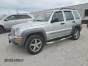 ✅ 2002 Jeep Liberty Sport • VIN: 1J4GK48K22W276888 • Lot: 86510274. Listed on Copart with 186,501 mi. Free auction sales archive from the USA and detailed vehicle history report at DreamBid. Image 1.