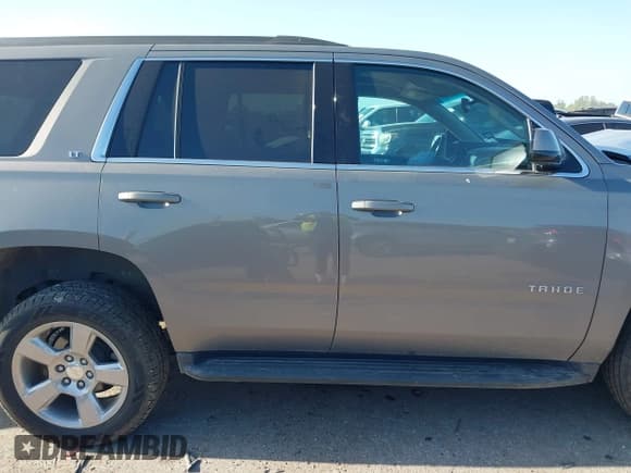 ✅ 2019 Chevrolet Tahoe LT • VIN: 1GNSCBKC7KR211527 • Lot: 42004179. Listed on IAAI with 36,593 mi. Free auction sales archive from the USA and detailed vehicle history report at DreamBid. Image 13.