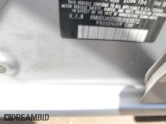 2008 Hyundai Elantra GLS z VIN KMHDU46D08U583872, wystawiony jako Copart lot #65808764 z przebiegiem 201 760 mil mil oraz Szkoda całkowita • Salvage title. Historia ofert i sprzedaży dostępna na DreamBid. Obrazek 13.