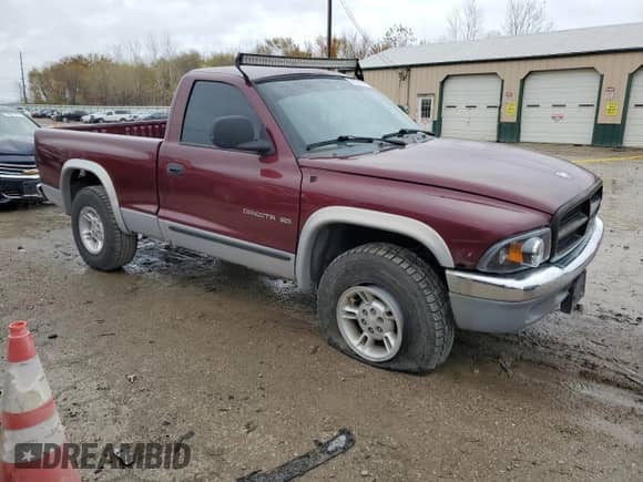 2000 Dodge Dakota Sport z VIN 1B7GG26N8YS795890, wystawiony jako Copart lot #78523764 z przebiegiem 214 933 mil mil oraz Szkoda całkowita • Salvage title. Historia ofert i sprzedaży dostępna na DreamBid. Obrazek 4.