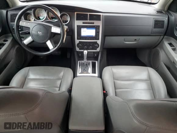 2006 Dodge Charger R/T с VIN 2B3KA53H76H134398, выставлен на аукционе Copart как лот 80212234 с пробегом 148 686 миль миль и Списание • Salvage title. История ставок и продаж доступна на DreamBid. Изображение 8.