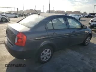 ✅ 2009 Hyundai Accent Auto GLS • VIN: KMHCN46C49U308801 • Лот: 70066164. Опубликован ранее на Copart с пробегом 131 181 миль. Бесплатный доступ к архиву аукционных продаж из США и подробный отчёт об истории автомобиля на DreamBid. Изображение 3.